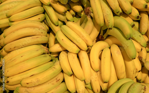Pile of fresh ripe bananas selling in the market 