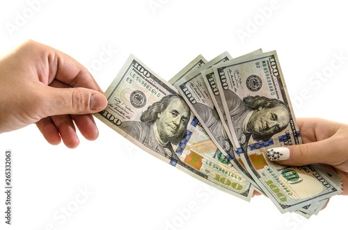 Hand giving dollar or paying for something.Business and financial concept.illegal money for bribery with pay cash.Corruption and remuneration concept