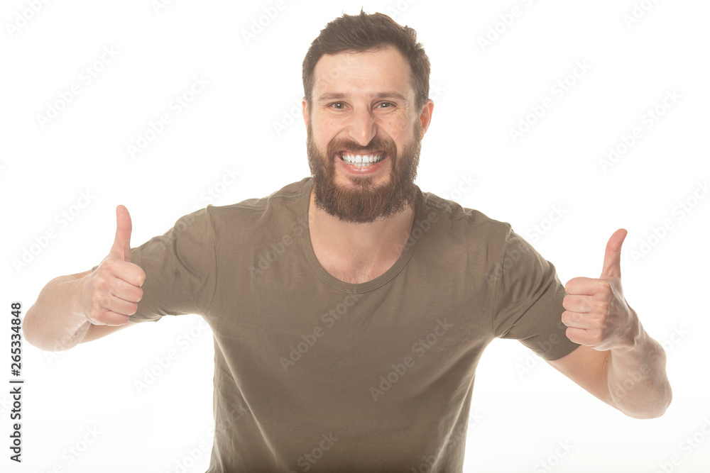 Portrait of a handsome young bearded man laughing Portrait of a handsome young bearded man laughing