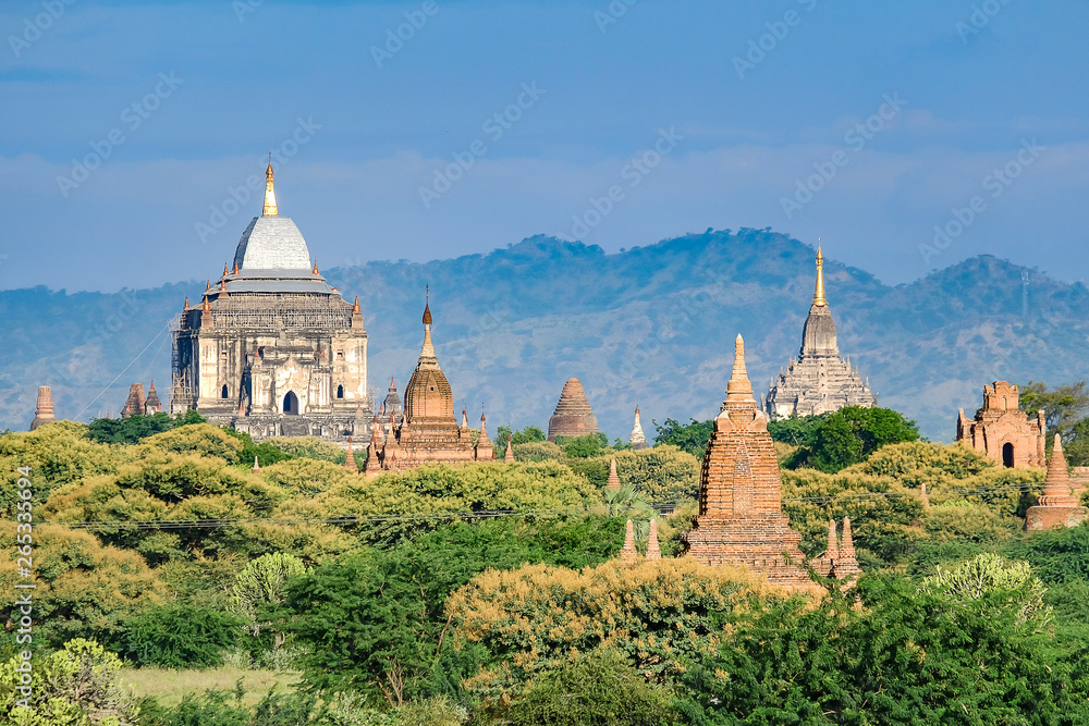 Fototapeta premium Beautiful morning ancient temples and pagoda in the Archaeological Zone, landmark and popular for tourist attractions and destination in Bagan, Myanmar. Asia Travel concept
