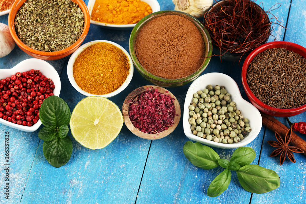 Spices and herbs variation on table. Food and cuisine ingredients. Spices and herbs variation on table. Food and cuisine ingredients.