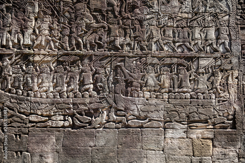 Bas reliefs at Bayon temple depicting the battles between Khmers and their traditional enemies the Chams, Angkor Thom, Siem Reap, Cambodia