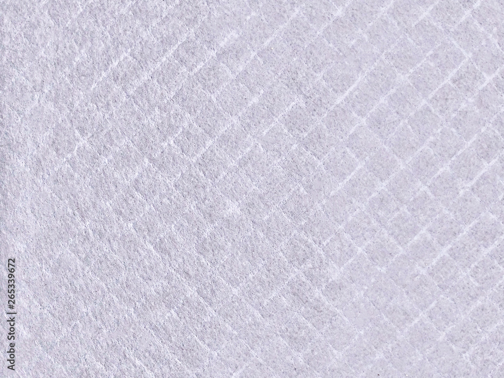 Fototapeta premium Texture of wool felt material. Soft cloth with pile, textiles rhombus. Background of rhombic felt fabric.