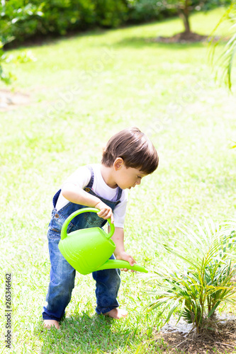 Happy Boy Watering Plants