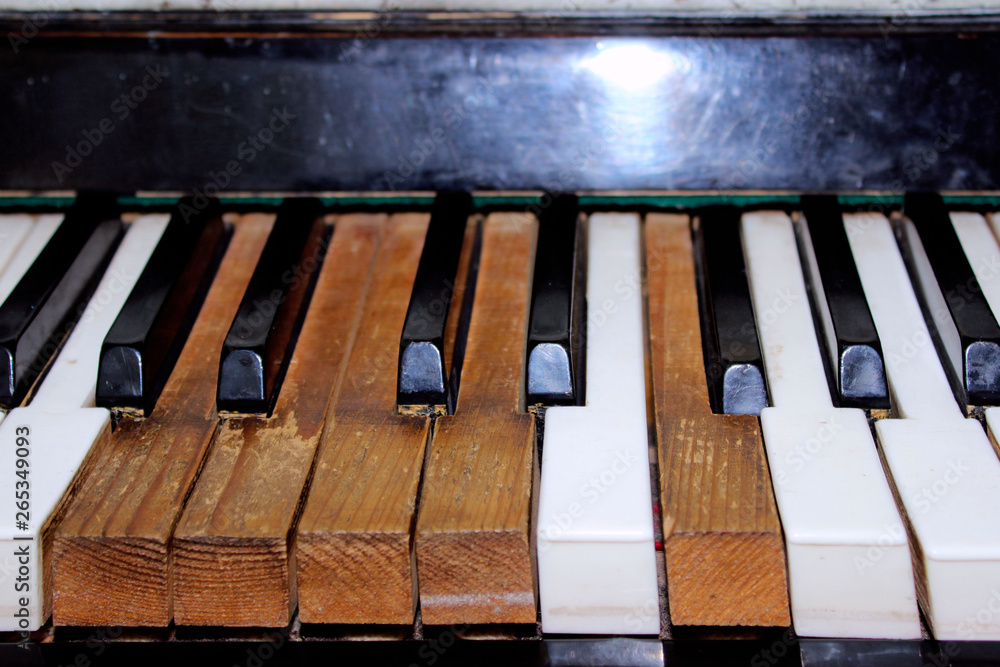 Cropped Shot Of An Old Piano. Broken Keys Of An Old Piano, Close Up. Broken Musical Instrument.