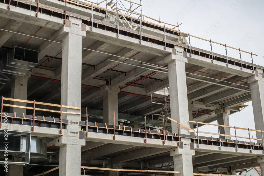 Fototapeta premium modern concrete bulding in construction with air conditioning piping