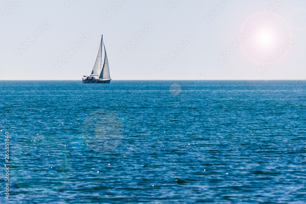 Fototapeta premium Sailing on the blue sea - photograph
