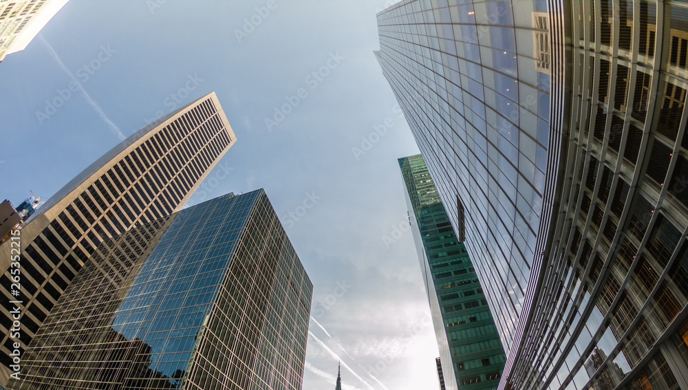 Wide angle upward view of skyscrapers buildings in New York, USA