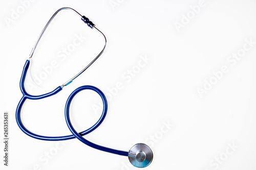 Stethoscope on white background. Doctor equipment. Medical background. Medicine, medical examination, health care concept. Copy space, top view
