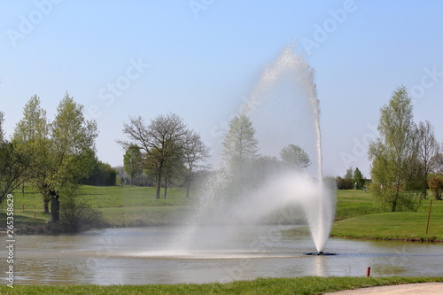 fountain on pond, park