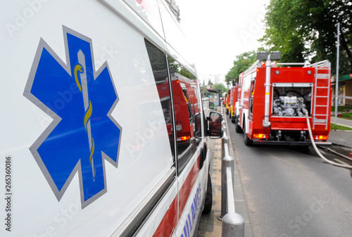 Paramedic vehicle and a fire truck at disaster scene