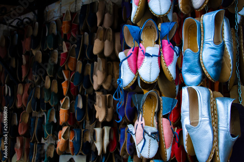 Traditional colorful Turkish handmade leather slipper shoes on a market in Gaziantep, Turkey.