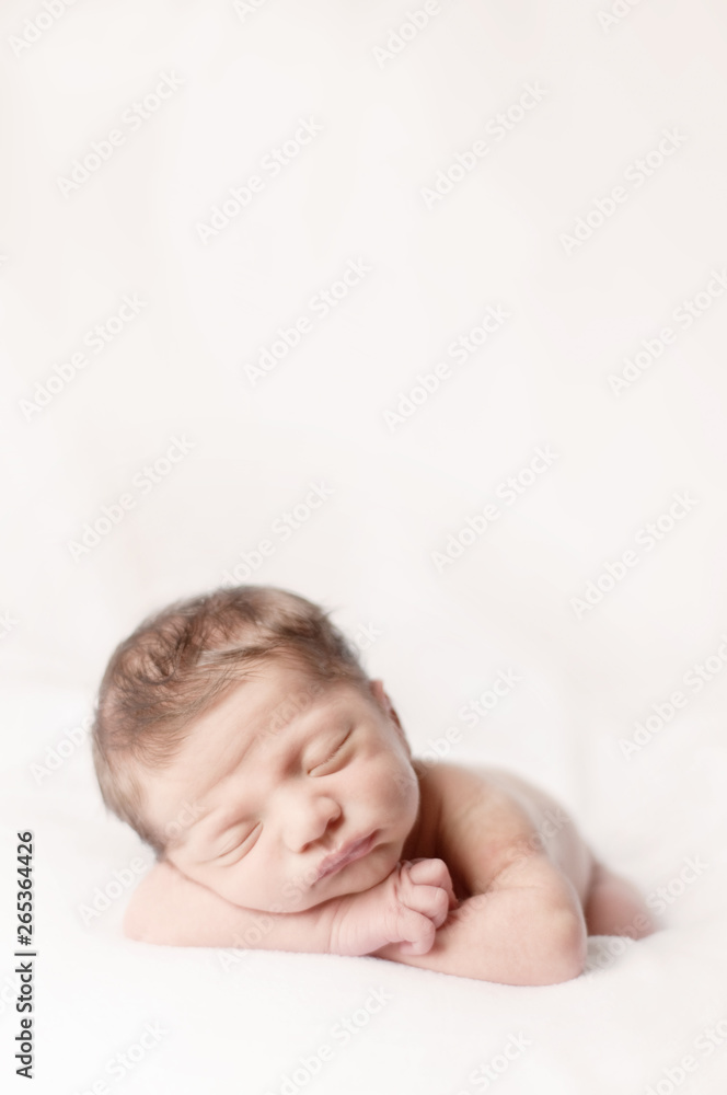 Newborn Baby Sleeping Peacefully on Soft Blanket - Arms Crossed Newborn Baby Sleeping Peacefully on Soft Blanket - Arms Crossed