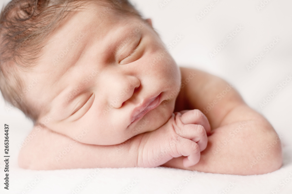 Newborn Baby Sleeping Peacefully on Soft Blanket - Arms Crossed