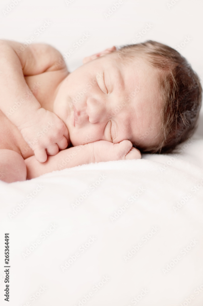 Newborn Baby Sleeping Peacefully on Soft Blanket Newborn Baby Sleeping Peacefully on Soft Blanket