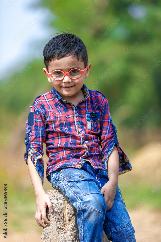Indian child wear eyeglass