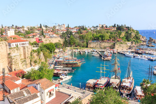 Fototapeta Naklejka Na Ścianę i Meble -  Mediterranean landscape in Antalya. View of the mountains, sea, yachts and the city - Antalya, Turkey, 04.23.2019
