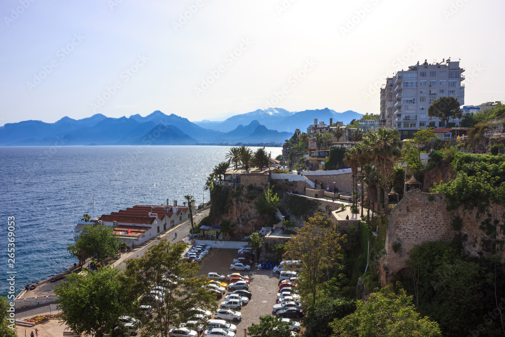 Mediterranean landscape in Antalya. View of the mountains, sea, yachts and the city - Antalya, Turkey, 04.23.2019