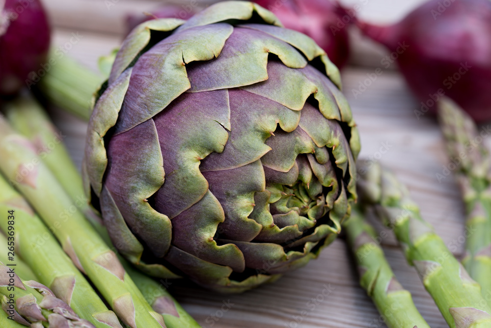 Fototapeta premium artichoke, asparagus, red onion healthy green and violet vegetables