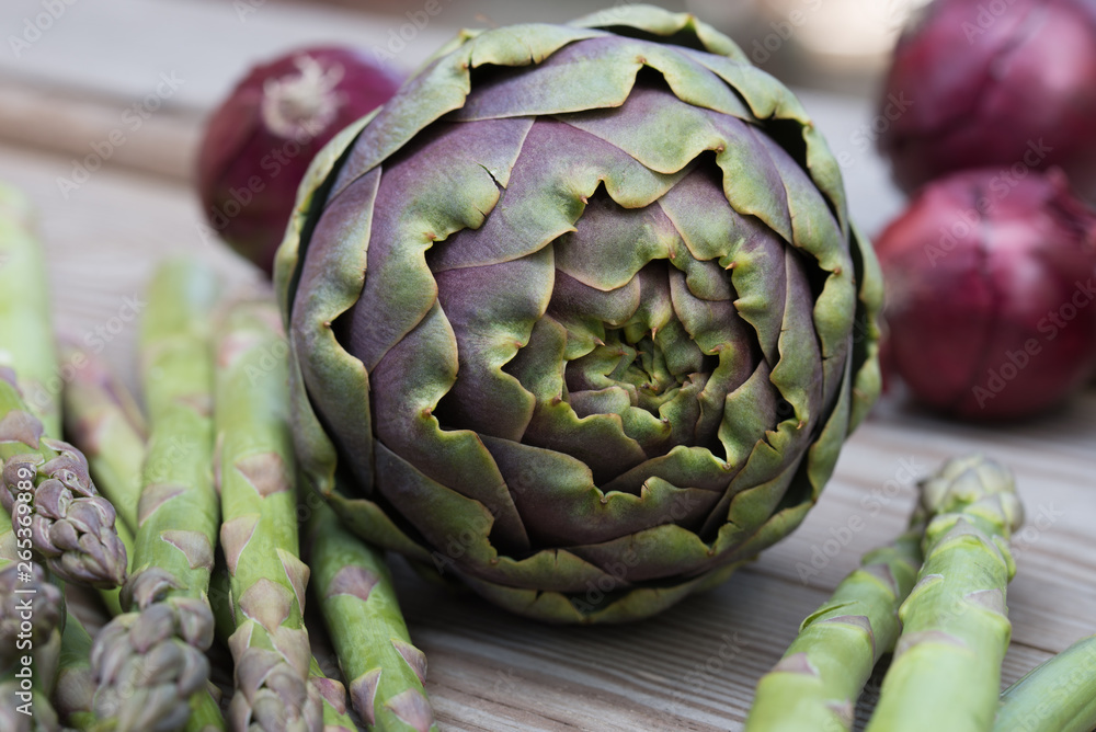 Fototapeta premium artichoke, asparagus, red onion healthy green and violet vegetables