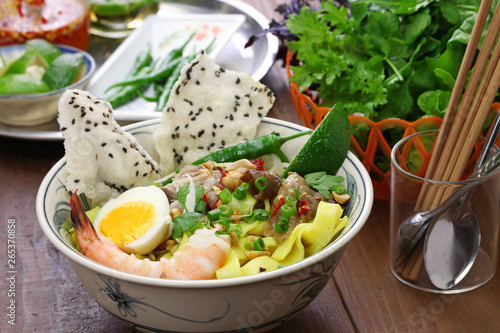 homemade Mi Quang; Vietnamese rice noodle cuisine photo