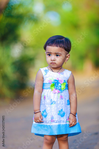 cute indian baby girl  playing in the park © Niks Ads