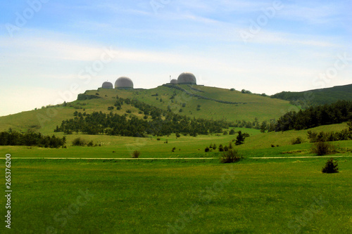 Observatory on the hill of green hill. Hilly landscape overlooking the Crimean radar in Yalta.