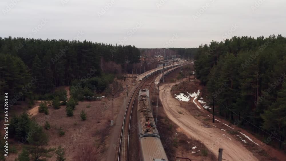Aerial view of train. Camera follows the train. Aerial view of train. Camera follows the train.