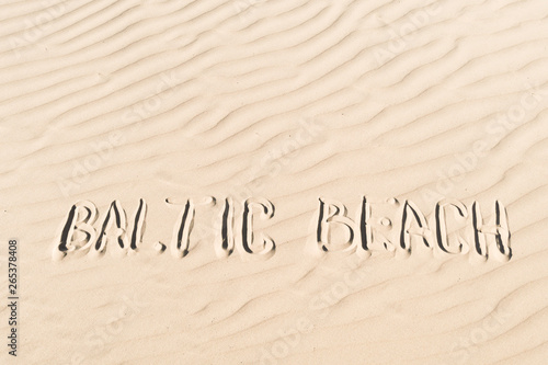 inscription on sand: baltic beach