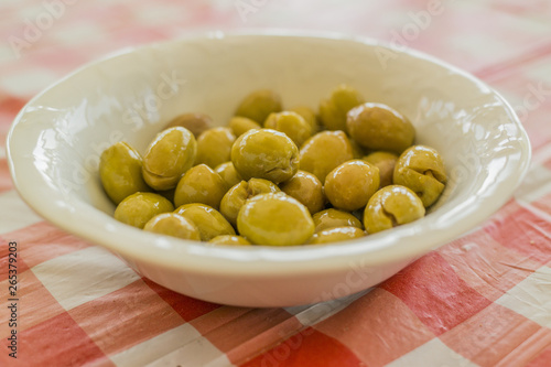 bowl of mediterrnean green olives are ready to eat for breakfast
