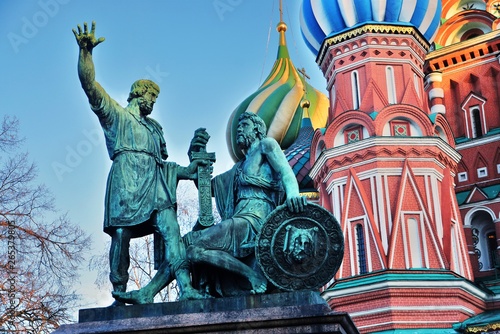 Monument to Minin and Pozharsky and Saint Basils Cathedral on the Red Square in Moscow	 photo