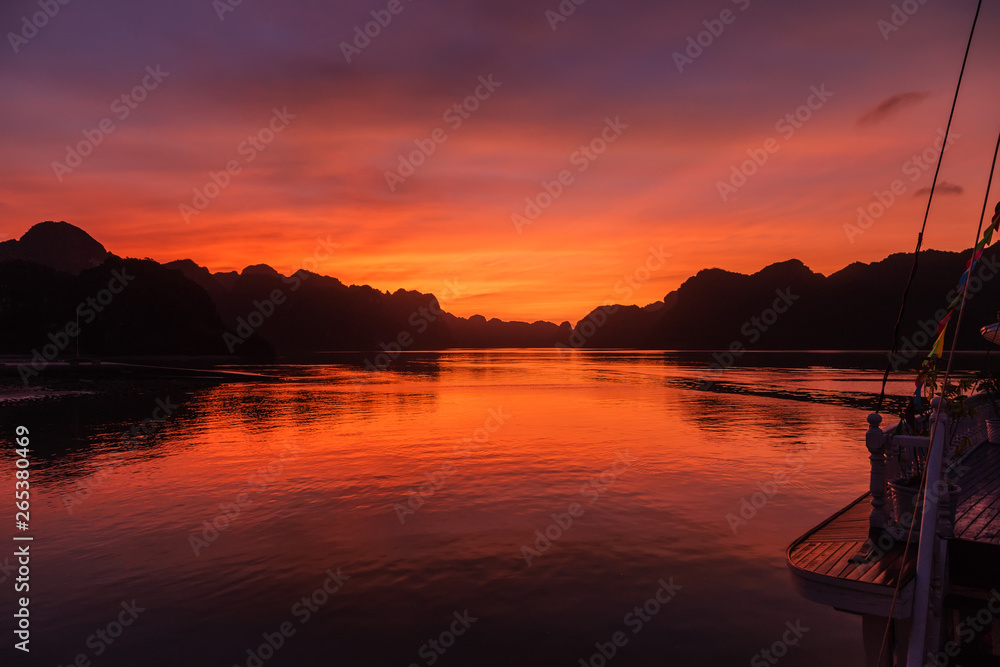 orange sky evening clouds Sunset Background. Vietnam Top Destinations, Ha Long Bay
