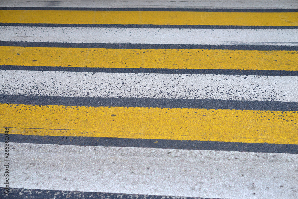 Fototapeta premium yellow and white Zebra crossing