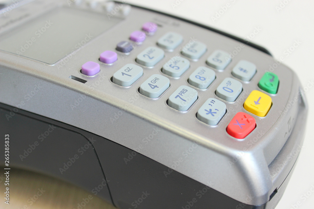 Credit cards reader.Close-up of payment machine , credit card machine isolated on white Credit cards reader.Close-up of payment machine , credit card machine isolated on white