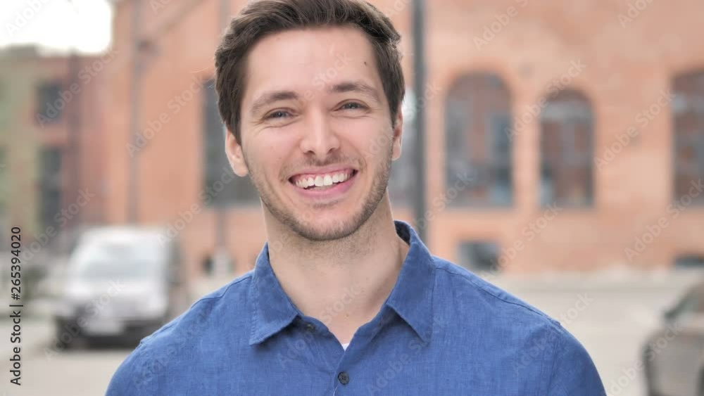 Outdoor Portrait of Young Man Inviting for New Project Outdoor Portrait of Young Man Inviting for New Project