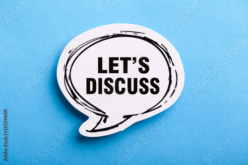 Let Us Discuss Speech Bubble Isolated On Blue Background