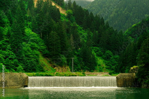 Fotografie Wide artificial waterfall at Uzungol Lake, Trabzon.