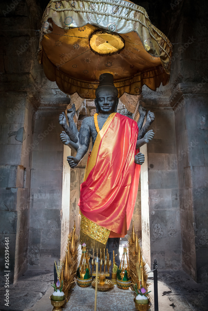Buddha sculpture at Angkor Wat temple in Siem Rap, Cambodia