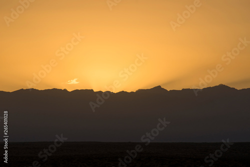 Beautiful morning glow on Helan peak © photobee