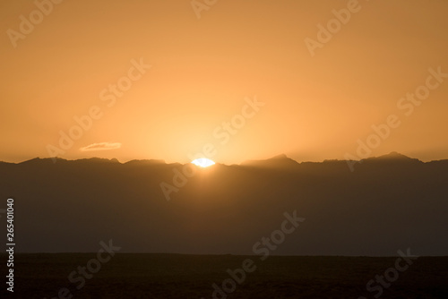 Beautiful morning glow on Helan peak © photobee