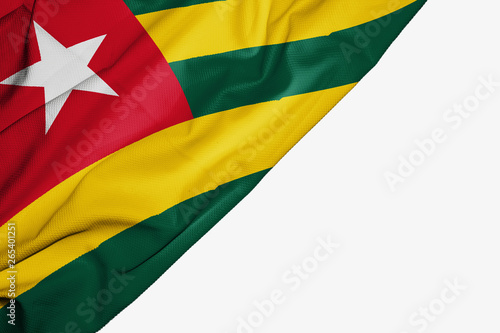 Togo flag of fabric with copyspace for your text on white background.