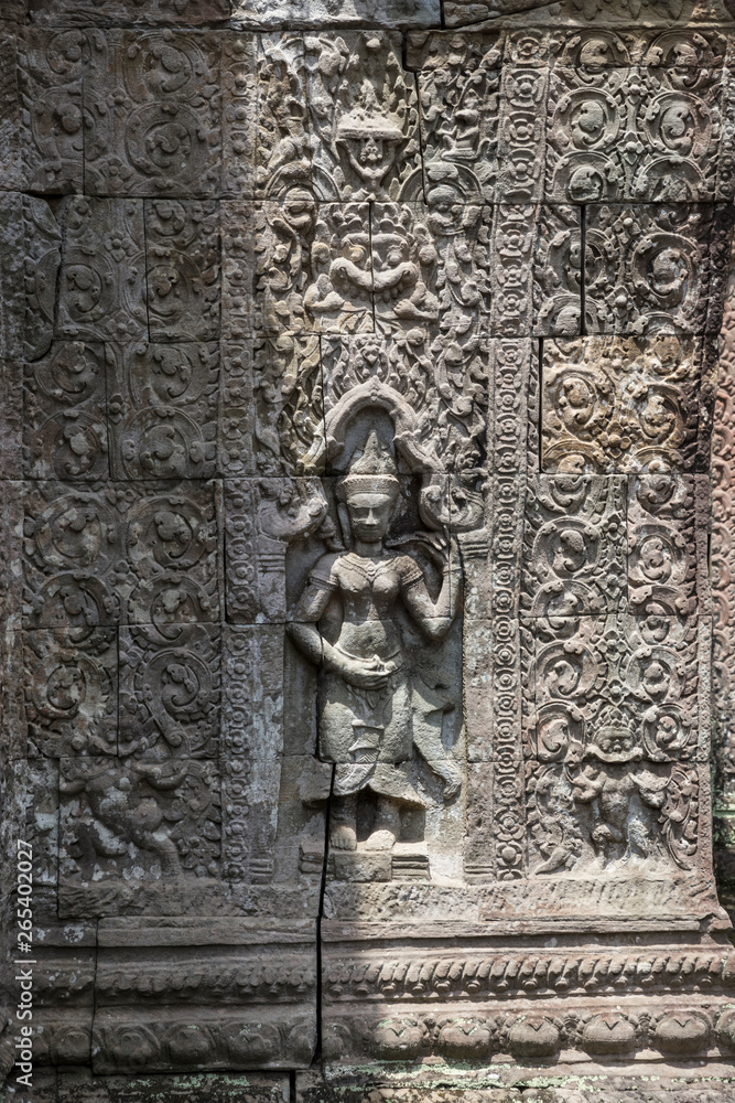 Sculpture and bas relief detail at Preah Khan temple in Siem Reap, Cambodia