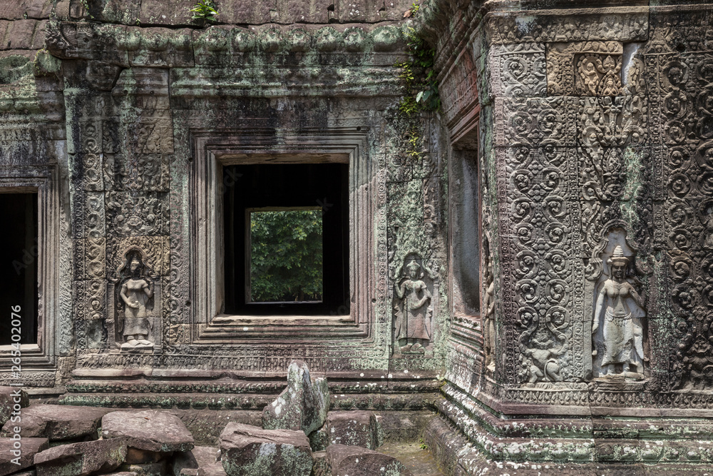Sculpture and bas relief detail at Preah Khan temple in Siem Reap, Cambodia Sculpture and bas relief detail at Preah Khan temple in Siem Reap, Cambodia