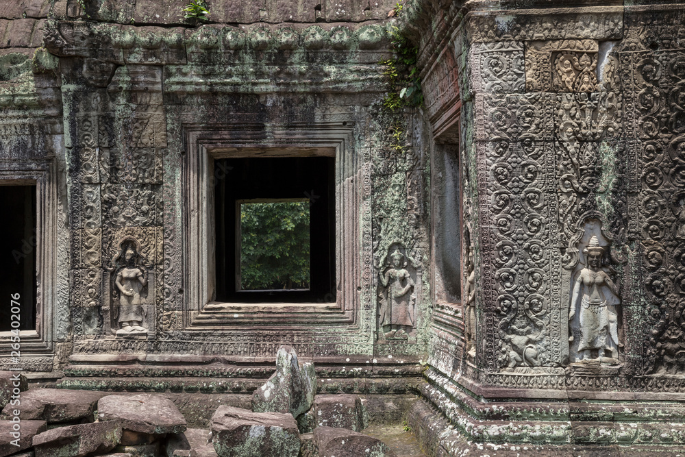 Sculpture and bas relief detail at Preah Khan temple in Siem Reap, Cambodia