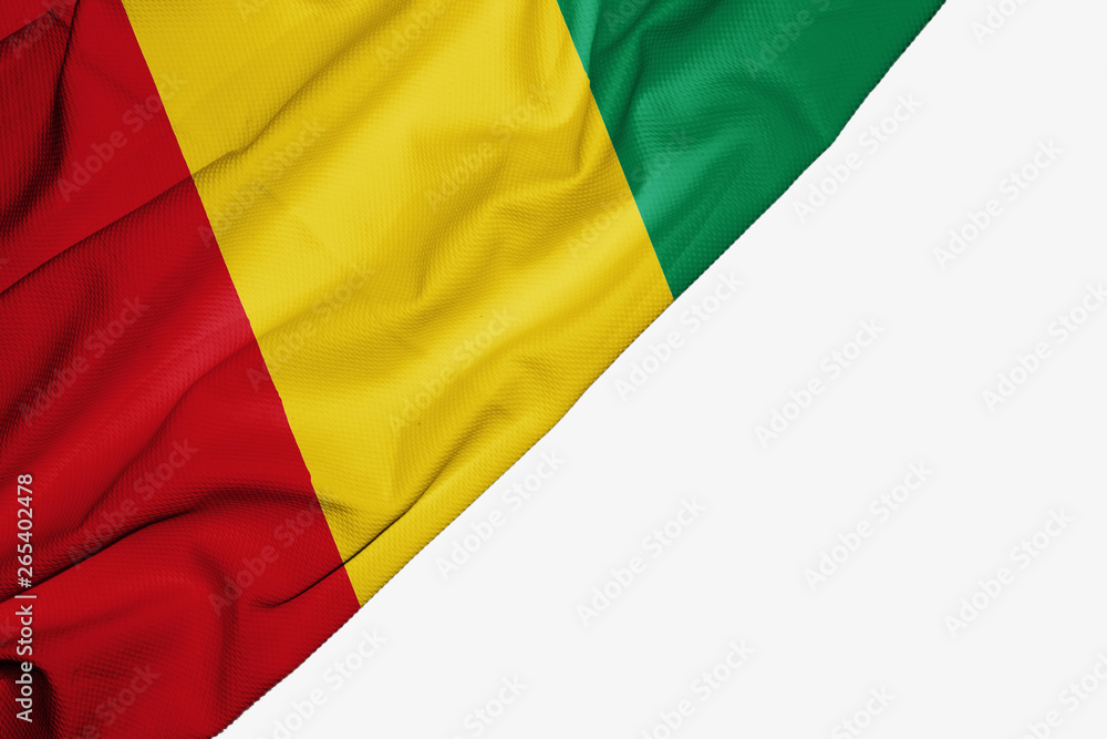 Guinea flag of fabric with copyspace for your text on white background. Guinea flag of fabric with copyspace for your text on white background.