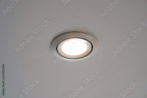 LED downlight or ceiling light Installed on a gray ceiling close up.