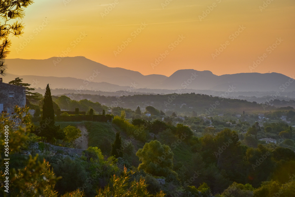 Beautiful cloudless orange sunrise over French countryside in the Maritime Alps