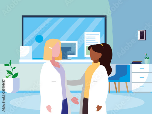 interracial female medicine workers in clinic reception