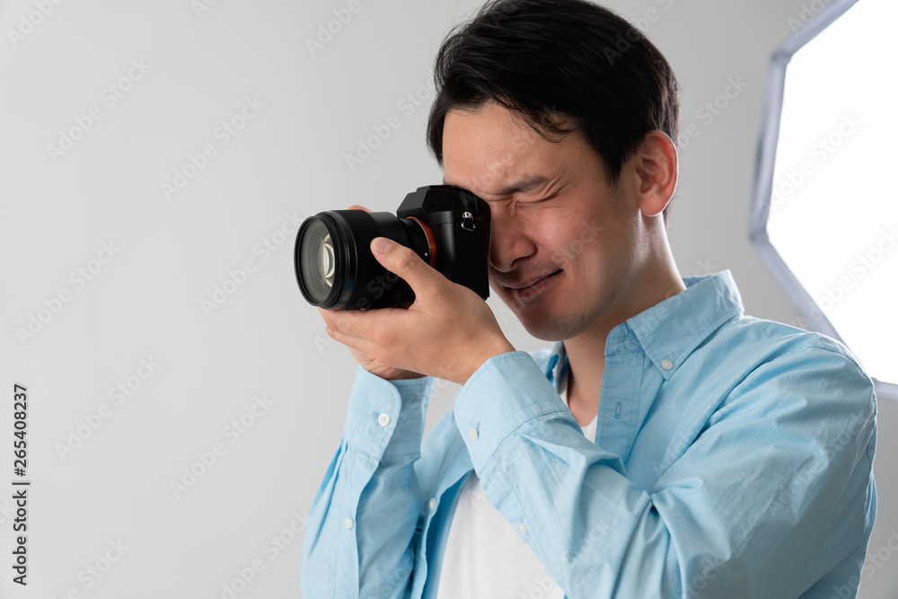 写真を撮るカメラマン 写真を撮るカメラマン