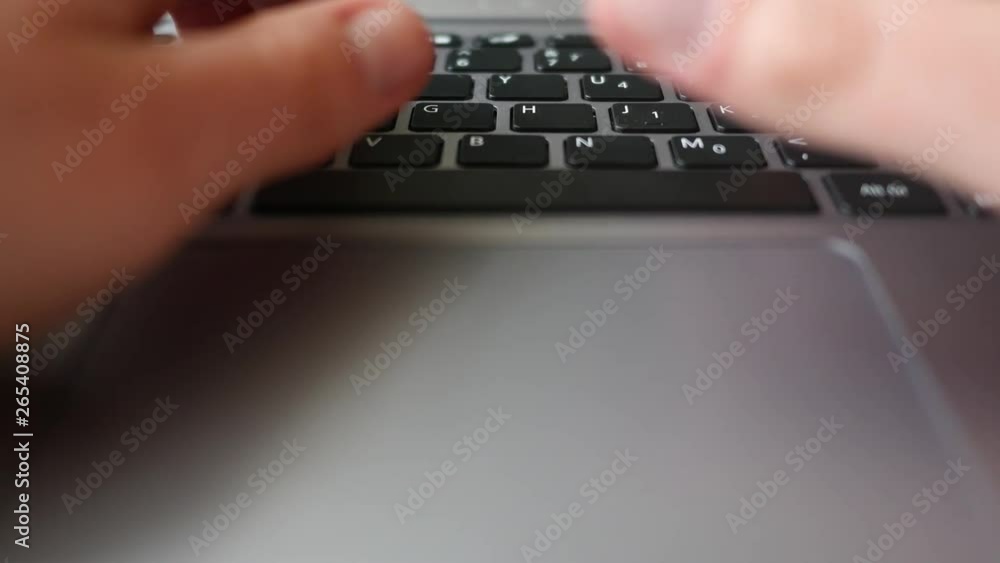 Finger dramatically presses the backspace button on laptop